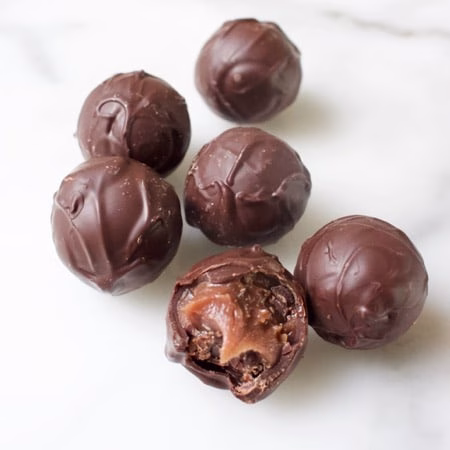 truffelkogels met sinaasappel bonbonvulling op basis van karamel